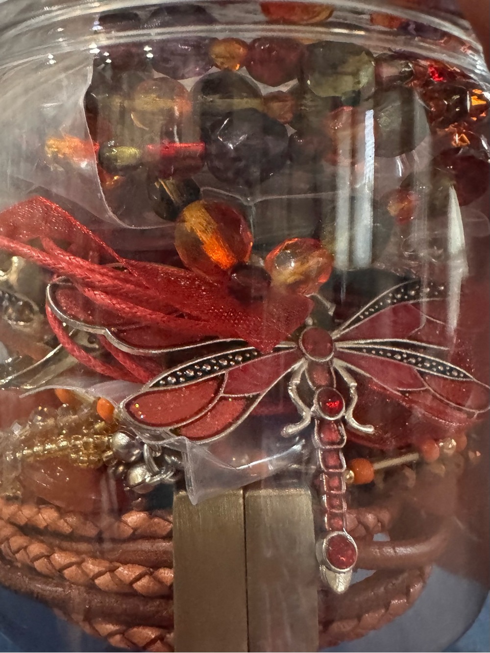 Beautiful Mystery Jewelry Jar featuring deep reds, corals and rich hues